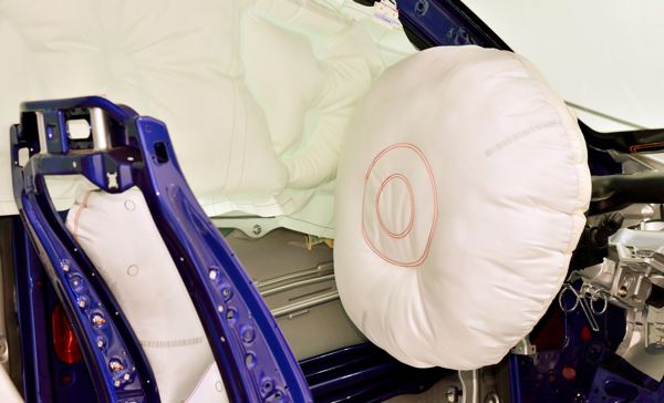 Inflated airbag in a car